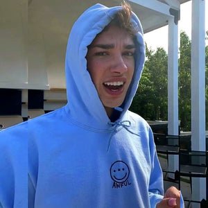 Youtuber James Charles Wearing Awful Cloth Blue Smiley Hoodie